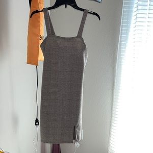 This dress is an XS and from Aeropostale. It has a cute slit at the end.
